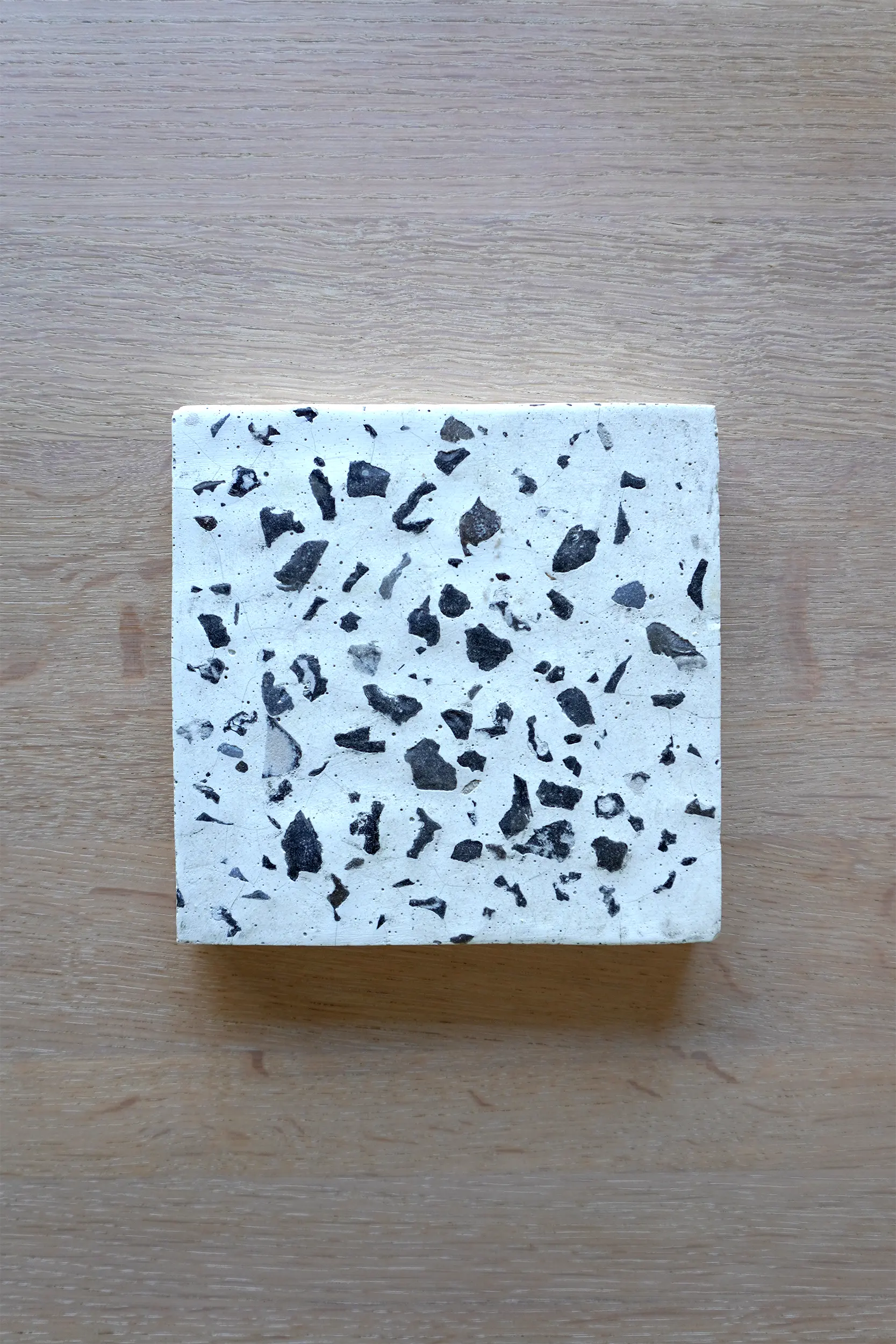 Material research into terazzo made from flint stone and white cement. Used for archictural applications